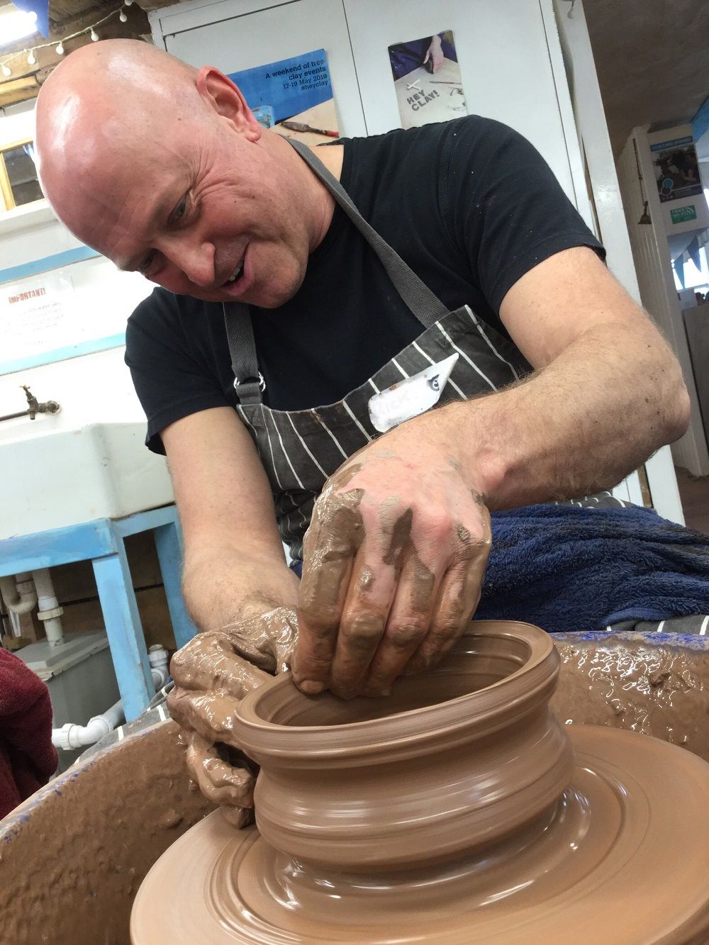 happy potters wheel weekend course participant at eastnor pottery