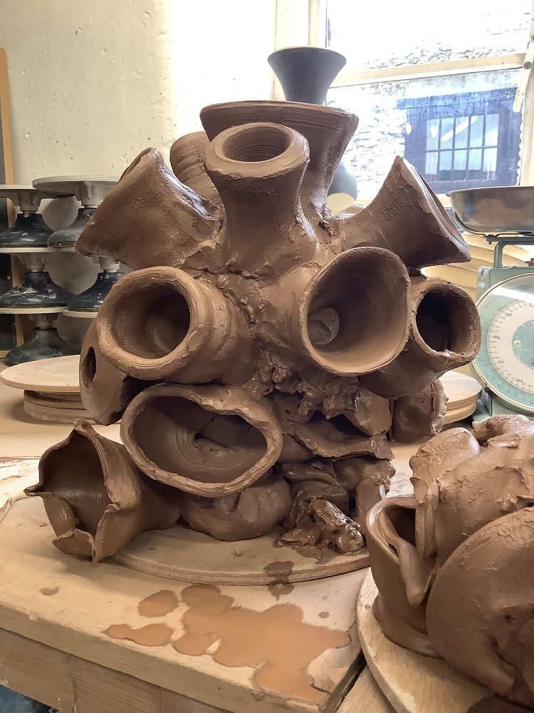 clay sculpture of rejected wet pots on a pottery course at eastnor pottery