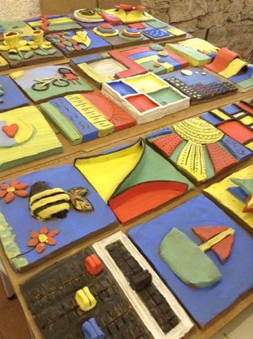 Fantastic tiles made at Eastnor Pottery by Mira Teambuilding participants