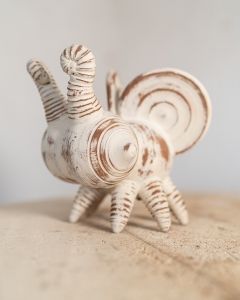 pottery flying bug made by potter and artist jon williams