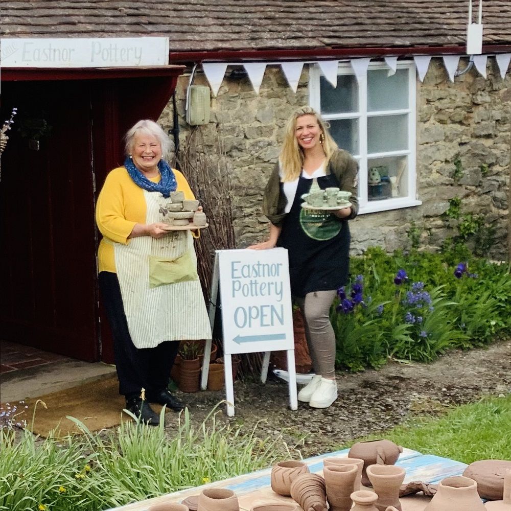 mother and daughter attending weekend pottery course