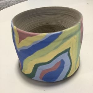 pot thrown on potters wheel and decorated at eastnor pottery by hca student on work experience