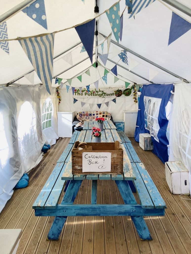 The potting tent marquee at eastnor pottery ready for it's annual spring clean