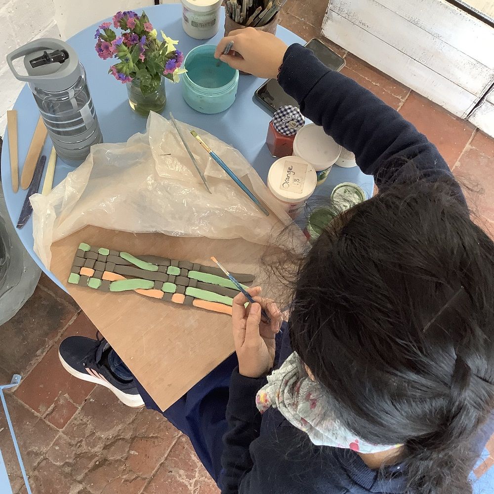 hereford college of art student doing undertaking work experience at eastnor pottery