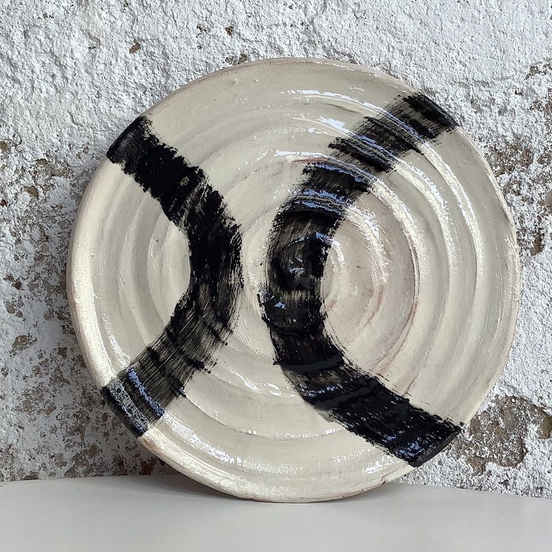 black and white plate made on pottery course at eastnor pottery